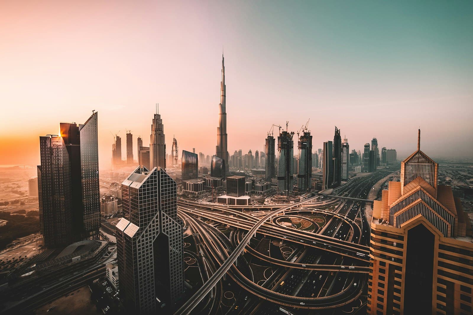 Modern university building in Dubai with the city skyline in the background