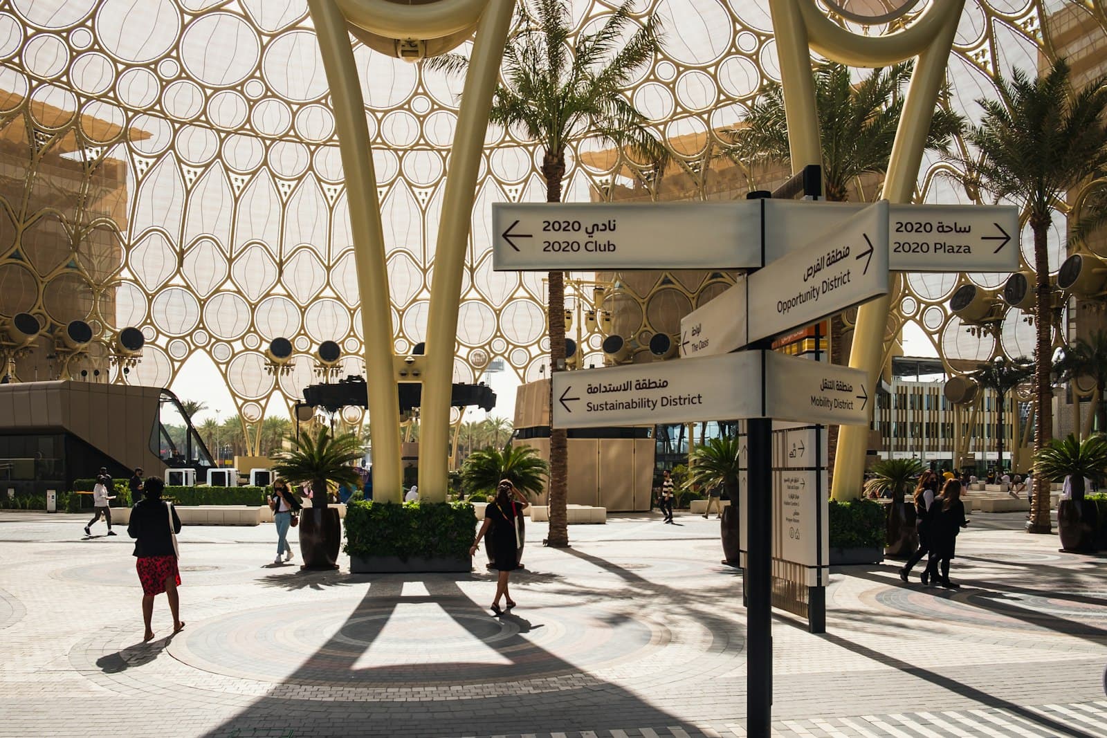 International students walking through a modern campus courtyard in Abu Dhabi