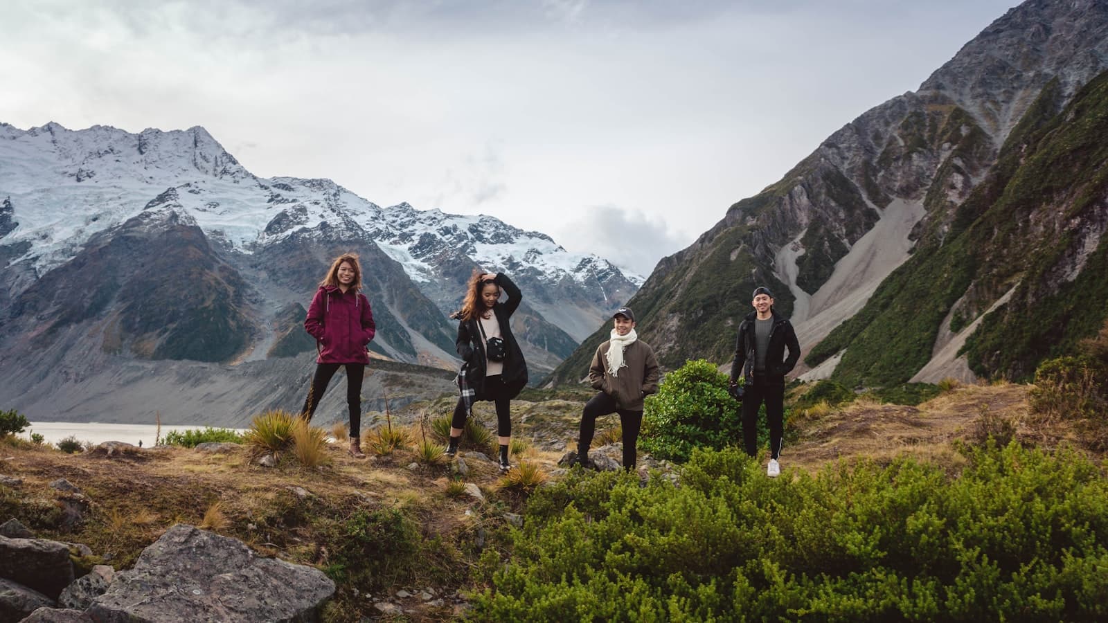 Group of international students hiking on a trail near Auckland